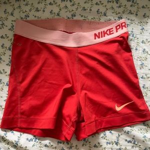 Red Nike Pro shorts